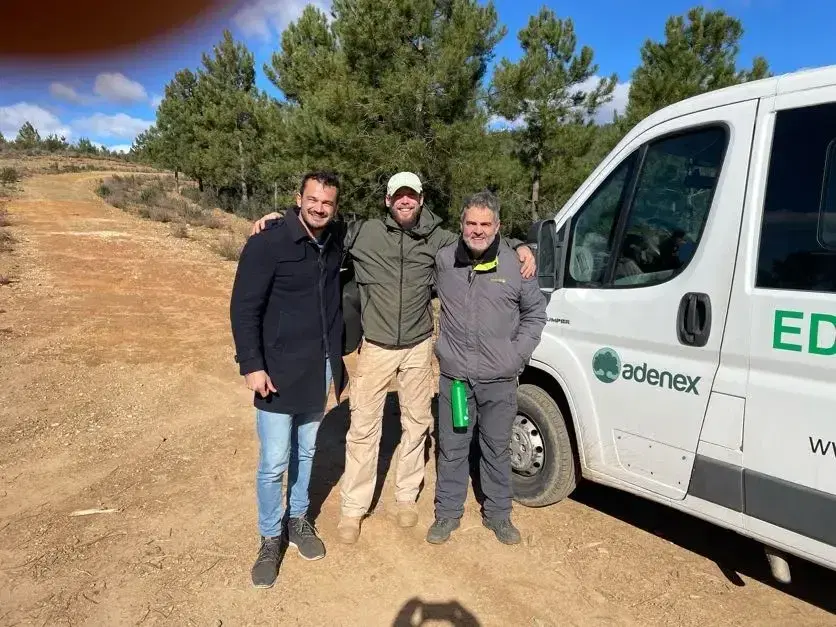 Gustavo and Vincent planting trees